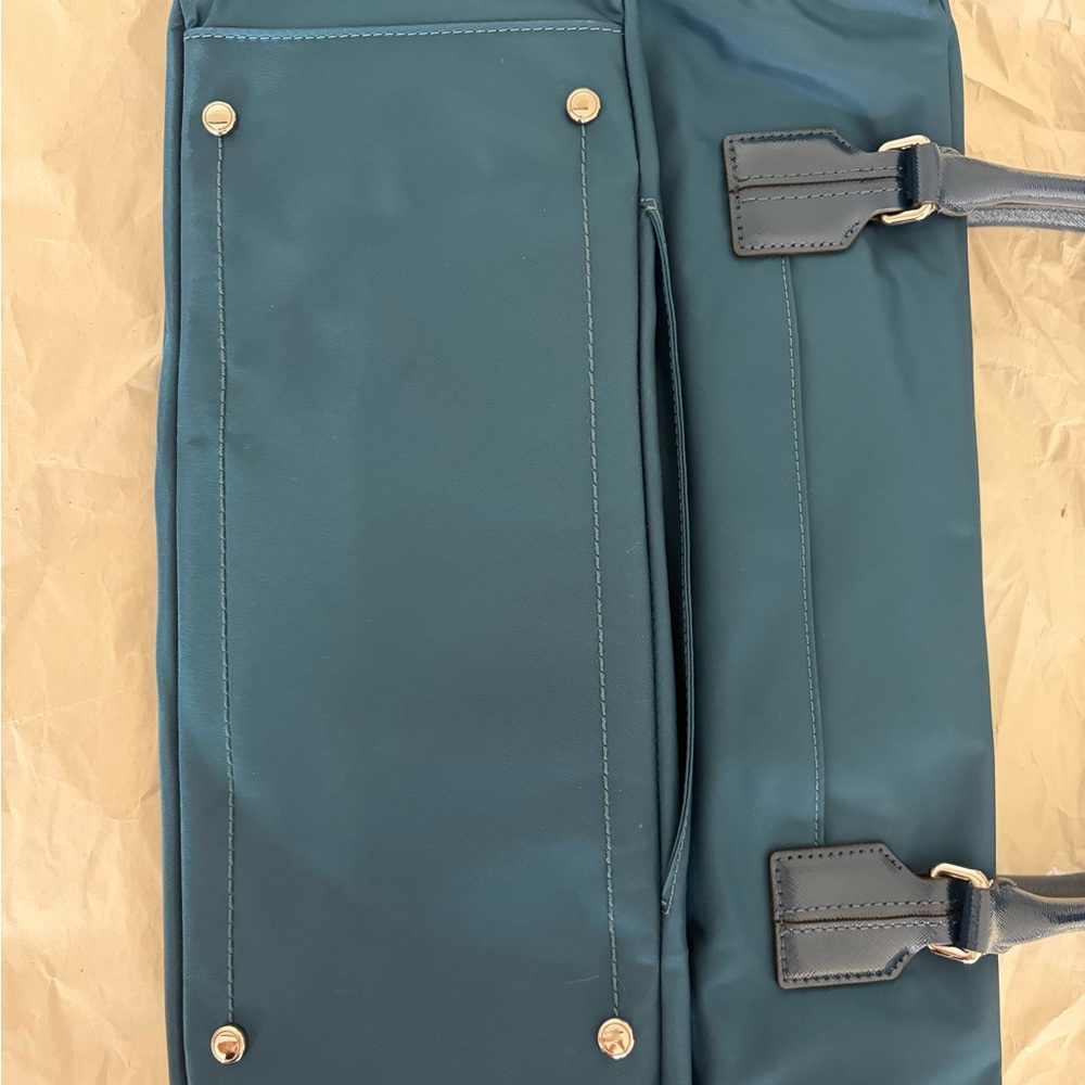 TUMI Navy Carry-On. Never used. Plastic still on inside zip. - Picture 7 of 7
